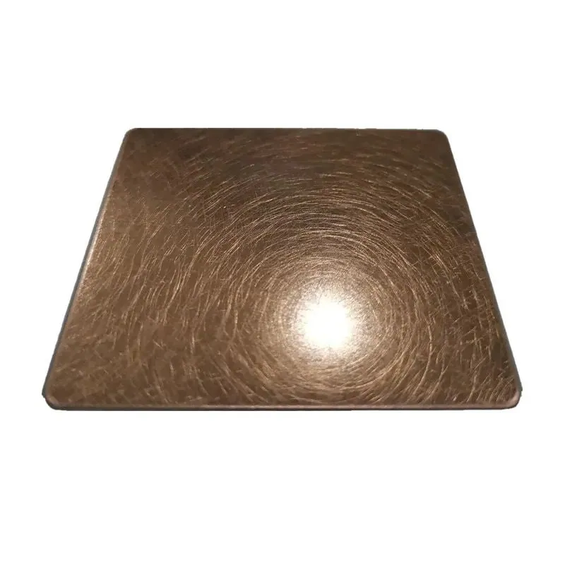 Bronze-toned decorative sheet with a circular brushed texture and a warm metallic sheen.