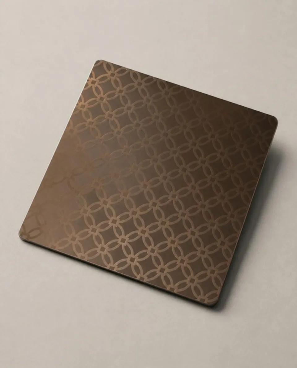 Bronze etched stainless steel sheet sample, etched pattern (AI studio visual)