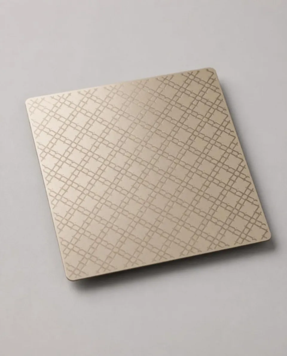 Champagne gold etched stainless steel sheet sample, etched pattern (AI studio visual)