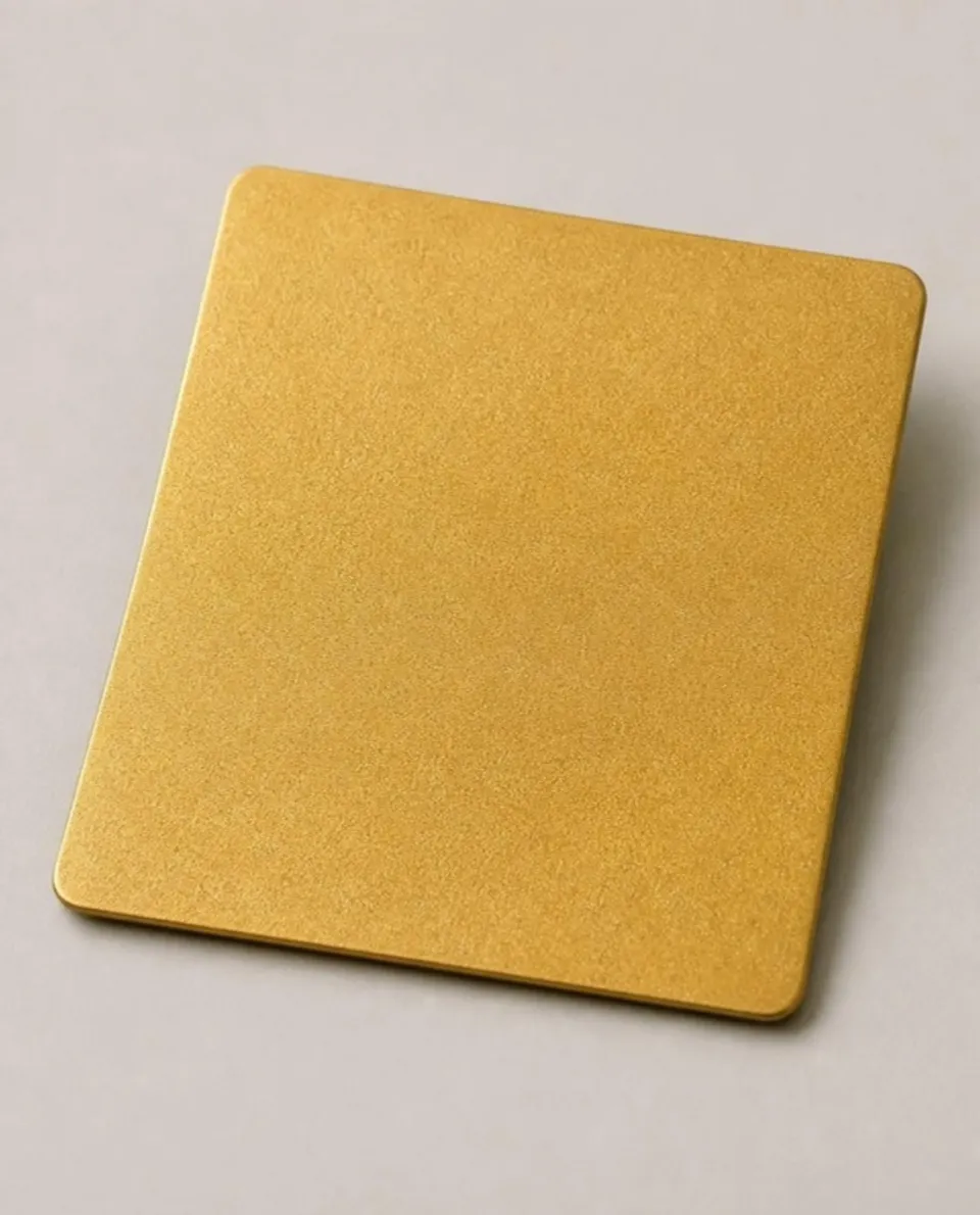 Gold bead blast stainless steel sheet sample, even sand-blasted texture (AI studio visual)