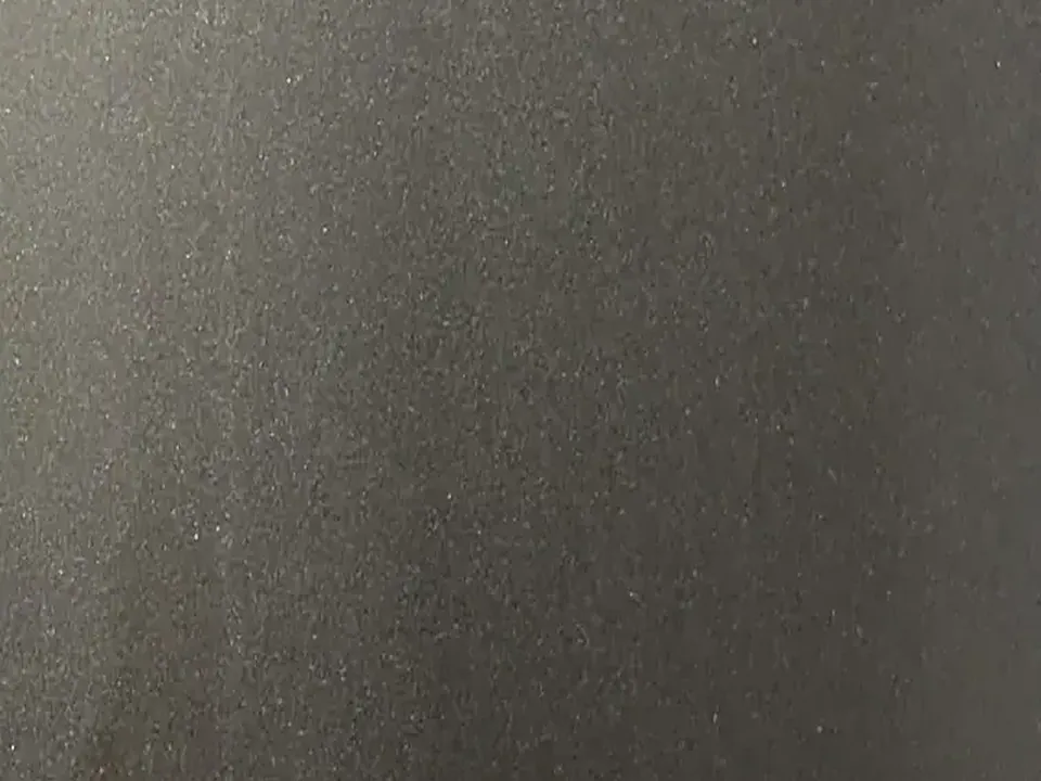 Close-up of a grey bronze bead blast stainless steel sheet