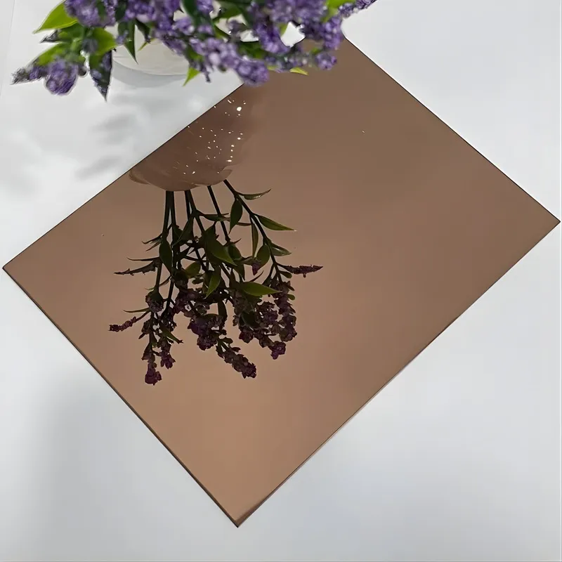 Rose gold mirror stainless steel sheet reflecting flowers