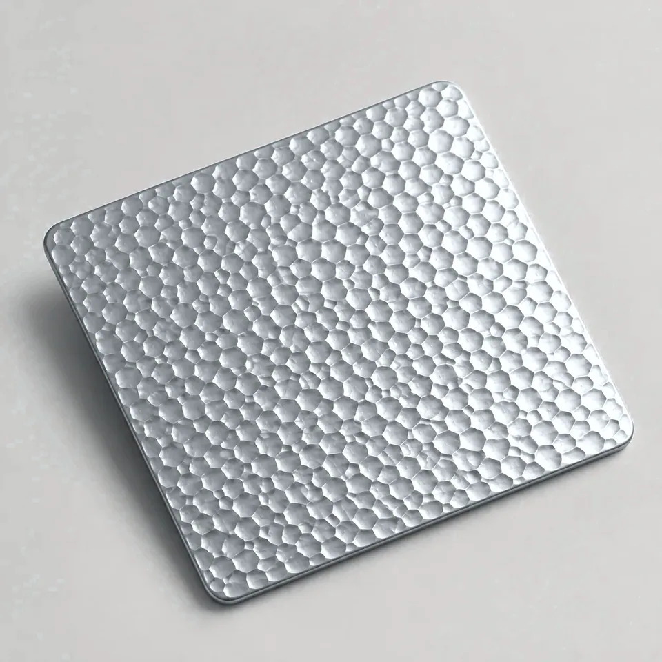 Natural silver embossed stainless steel sheet sample, second view (studio visual)