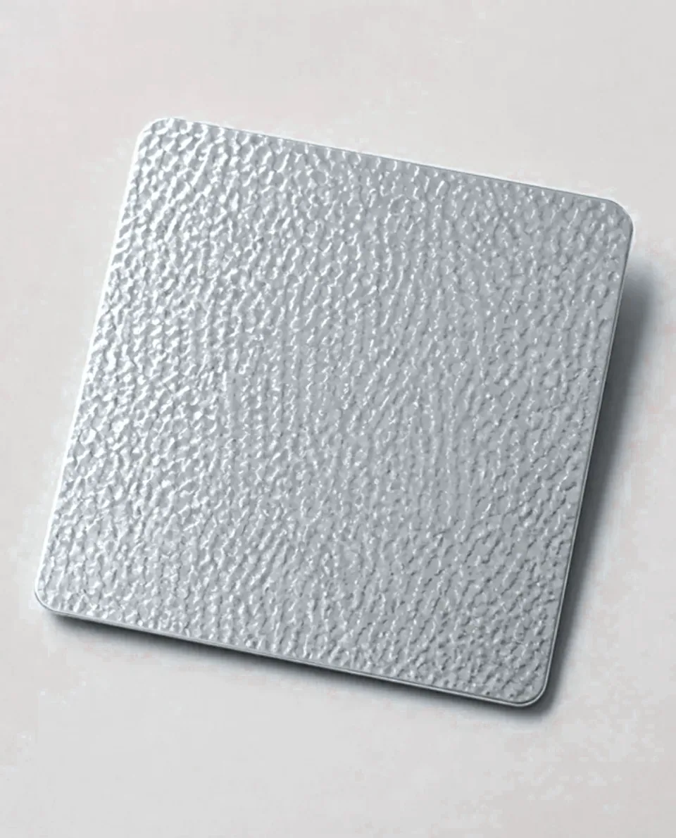 Natural silver embossed stainless steel sheet sample (studio visual)