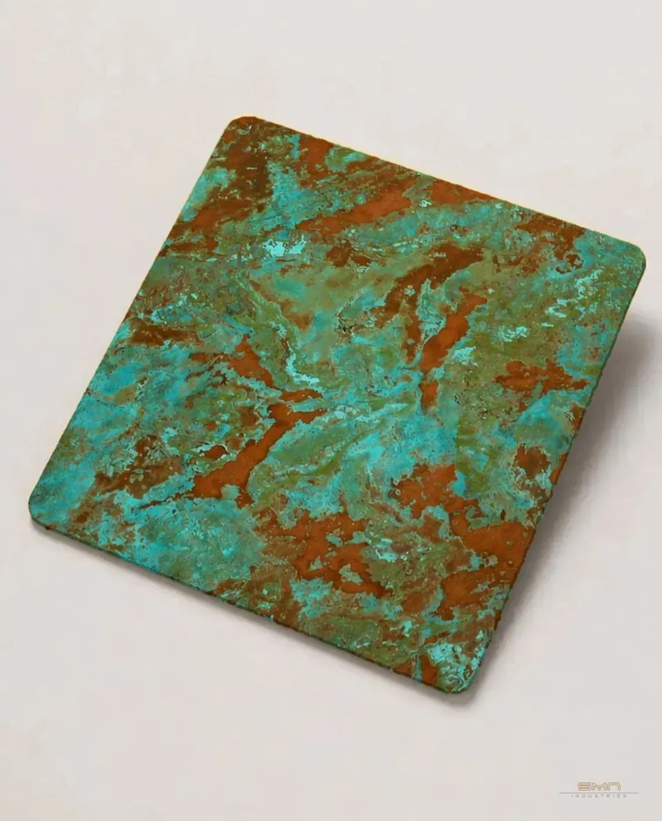 Verdigris aged metal stainless steel sheet sample with a turquoise patina